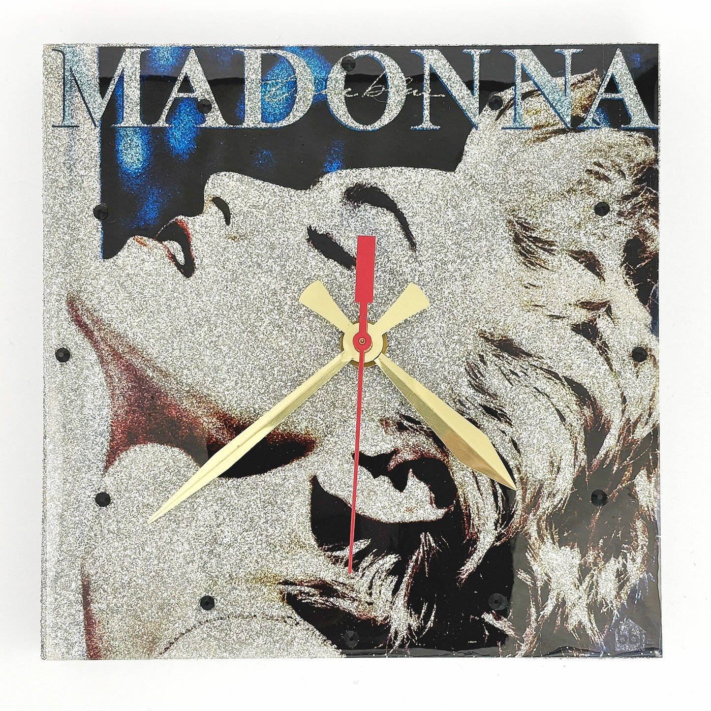 Custom Album Cover Clock 8x8" sample: Madonna True Blue album art with silver glitter underlay, brass hour and minute hands, red second hand, black crystal hour markers